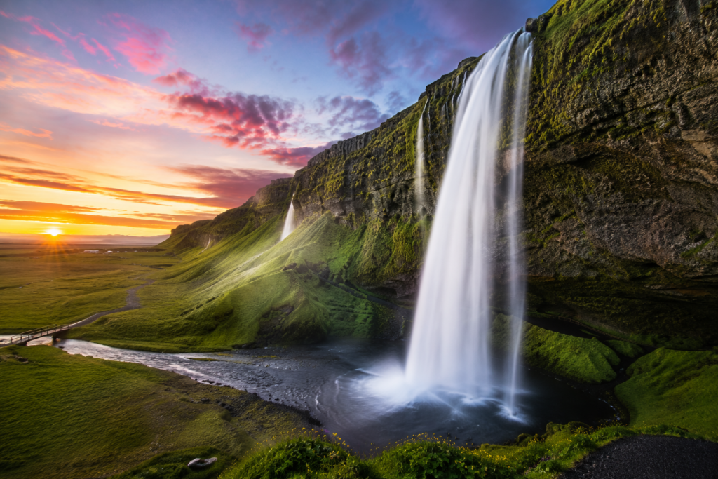 Discover Iceland's stunning South Coast featuring the iconic Skógafoss and Seljalandsfoss waterfalls on a customized Iceland itinerary by MS Travel Concierge.